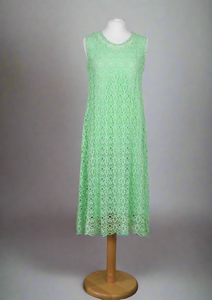 This dress is made from beautiful green lace macramè with a separate viscose lining. Perfect for any spring summer occasion, from a wedding - mother of the bride, mother of the groom and wedding guest to everyday wear.  This dress will take you from day to night with effortless style and elegance.