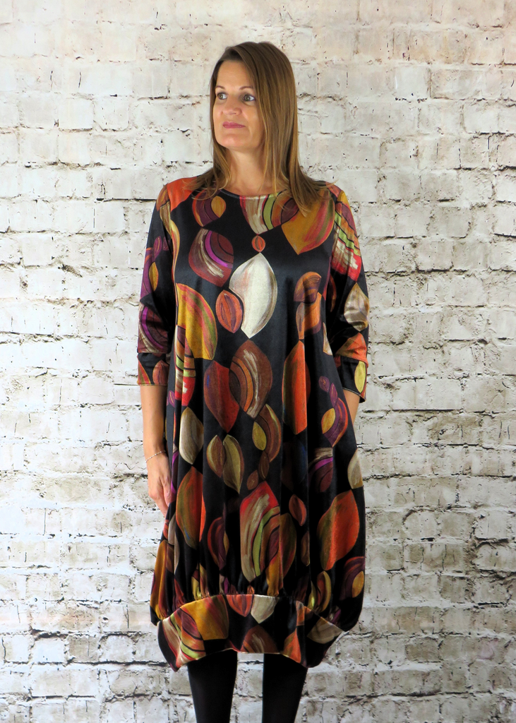 The Gathered Hem dress is made from a soft stretch viscose velvet fabric, with a beautiful all over brown autumnal design. Perfect for any autumn winter occasion, from a wedding Mother of the Bride, Mother of the Groom, Wedding Guest to a party or everyday wear. This dress will take you from day to night with effortless style and elegance