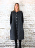 This coat dress is made from a black cotton fabric, with a beautiful marble effect body and black jersey arms . Perfect for any autumn winter occasion, from a wedding, Mother of the Bride, Mother of the Groom, Wedding Guest to a party or everyday wear. This dress will take you from day to night with effortless style and elegance.