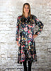 This button dress is made from a black vegan habotai, with a beautiful brightly coloured flower print. Perfect for any autumn winter occasion, from a wedding, Mother of the Bride, Mother of the Groom, Wedding Guest to a party or everyday wear. This dress will take you from day to night with effortless style and elegance.