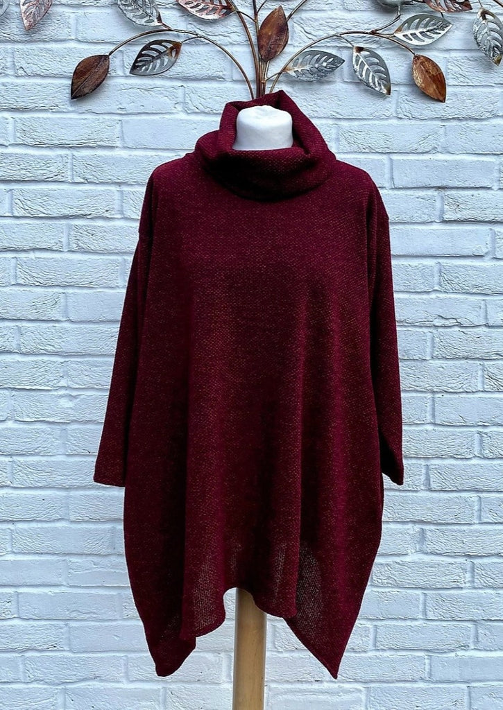 The cowl tunic jumper is made from a soft lightweight red knitted fabric. Perfect for any autumn winter occasion or everyday wear. This jumper will take you from day to night with effortless style and elegance.