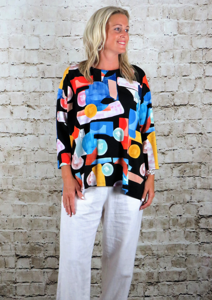 This wide top is made from a soft black jersey, with a beautiful all over multi colour print. Perfect for any spring summer occasion, from a wedding to any celebration to everyday wear. The wide top will take you from day to night with effortless style and elegance.