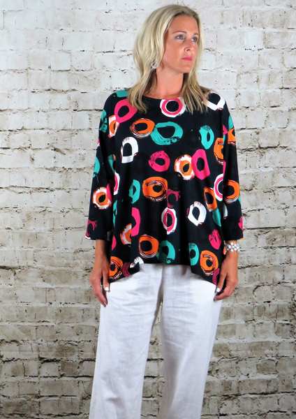 This wide top is made from a soft navy jersey, with a beautiful all over multi colour print. Perfect for any spring summer occasion, from a wedding to any celebration to everyday wear. The wide top will take you from day to night with effortless style and elegance.