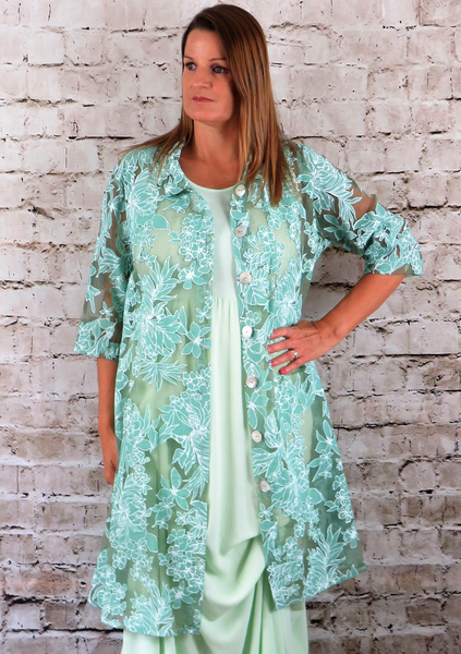This coat is made from a soft green organza fabric, with a beautiful all over floral design. Perfect for any spring summer occasion, from a wedding - mother of the bride, mother of the groom and wedding guest to everyday wear. This coat will take you from day to night with effortless style and elegance.
