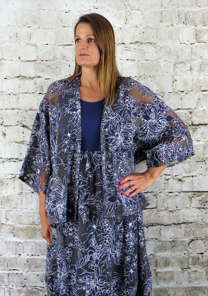This kimono is made from a soft navy organza fabric, with a beautiful all over floral design. Perfect for any spring summer occasion, from a wedding - mother of the bride, mother of the groom and wedding guest to everyday wear. This kimono will take you from day to night with effortless style and elegance.
