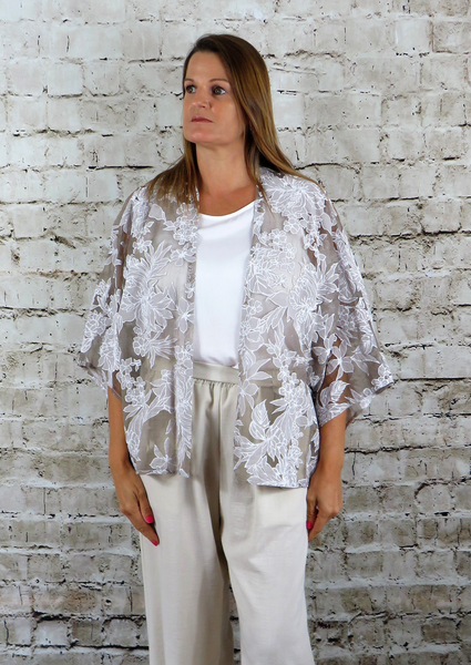 This kimono is made from a soft grey organza fabric, with a beautiful all over floral design. Perfect for any spring summer occasion, from a wedding - mother of the bride, mother of the groom and wedding guest to everyday wear. This kimono will take you from day to night with effortless style and elegance.