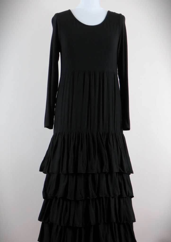 This Tiered Dress has a black Jersey top with a Silk tiered skirt. Perfect for any autumn winter occasion, from a wedding Mother of the Bride, Mother of the Groom, Wedding Guest to a party or everyday wear. This dress will take you from day to night with effortless style and elegance.