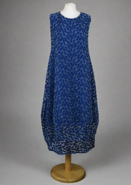 This sleeveless dress is made from a beautiful navy leaf embroidery with a viscose lining. Perfect for any spring summer occasion, from a wedding - mother of the bride, mother of the groom and wedding guest to a party and everyday wear. This dress will take you from day to night with effortless style and elegance.