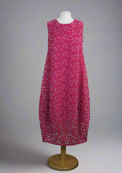 This sleeveless dress is made from a beautiful cerise leaf embroidery with a viscose lining. Perfect for any spring summer occasion, from a wedding - mother of the bride, mother of the groom and wedding guest to a party and everyday wear. This dress will take you from day to night with effortless style and elegance.