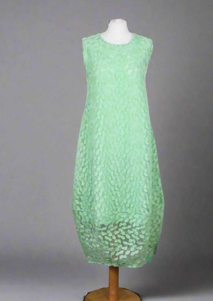 This sleeveless dress is made from a beautiful green leaf embroidery with a viscose lining. Perfect for any spring summer occasion, from a wedding - mother of the bride, mother of the groom and wedding guest to a party and everyday wear. This dress will take you from day to night with effortless style and elegance.