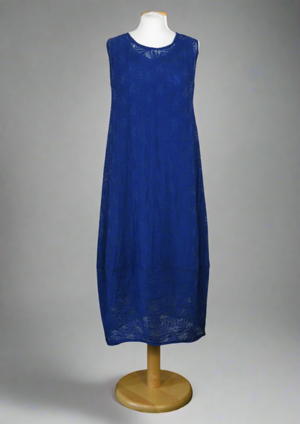 This sleeveless dress is made from a navy sheer fabric with a beautiful all over shell design, and a soft viscose lining. Perfect for any spring summer occasion, from a wedding - mother of the bride, mother of the groom and wedding guest to everyday wear. This dress will take you from day to night with effortless style and elegance. A matching shrug is available.