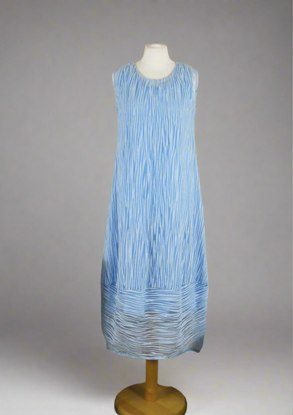 This sleeveless dress is made from a blue sheer fabric with a beautiful all over stripe design, and a soft viscose lining. Perfect for any spring summer occasion, from a wedding - mother of the bride, mother of the groom and wedding guest to everyday wear. This dress will take you from day to night with effortless style and elegance. A matching shrug is available.