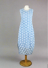 This sleeveless dress is made from a blue sheer fabric with a beautiful all over spot design, and a soft viscose lining. Perfect for any spring summer occasion, from a wedding - mother of the bride, mother of the groom and wedding guest to everyday wear. This dress will take you from day to night with effortless style and elegance. A matching shrug is available.