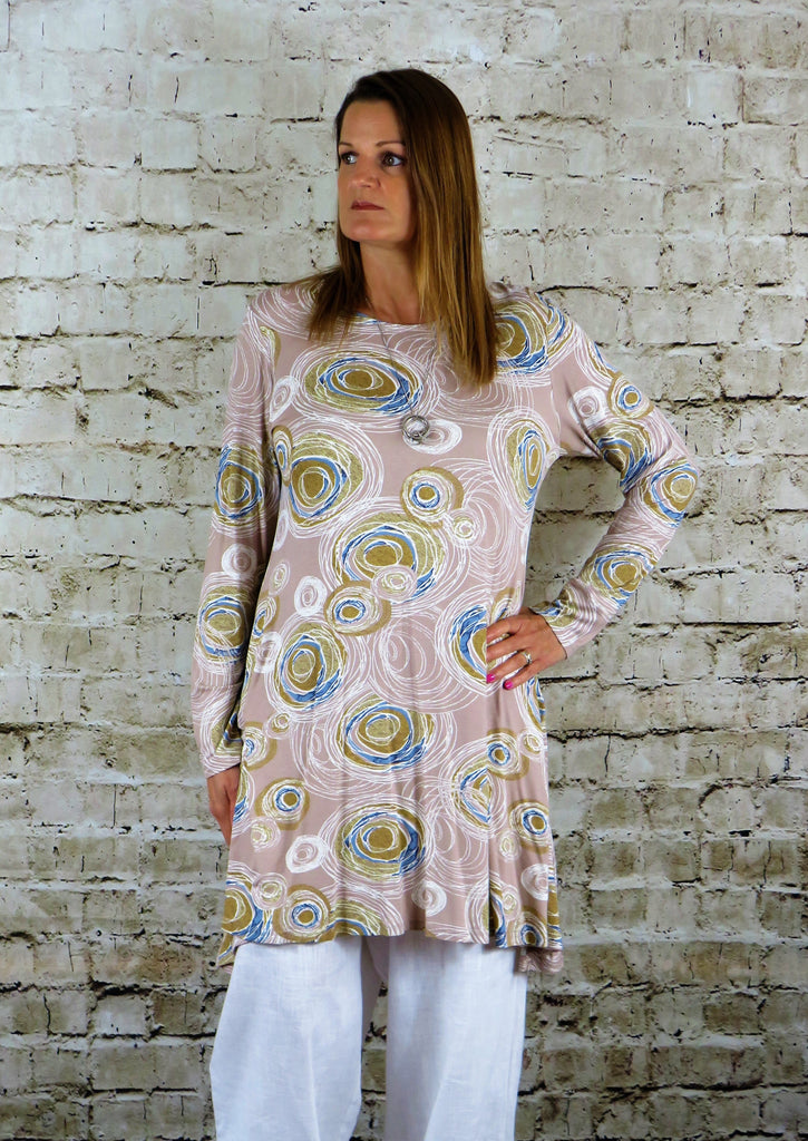 This tunic is made from a soft feel jersey, with a beautiful all over multi colour print. Perfect for any spring summer occasion, from a wedding to any celebration to everyday wear. The wide top will take you from day to night with effortless style and elegance. Available in Black, Charcoal, Lime and Sand.