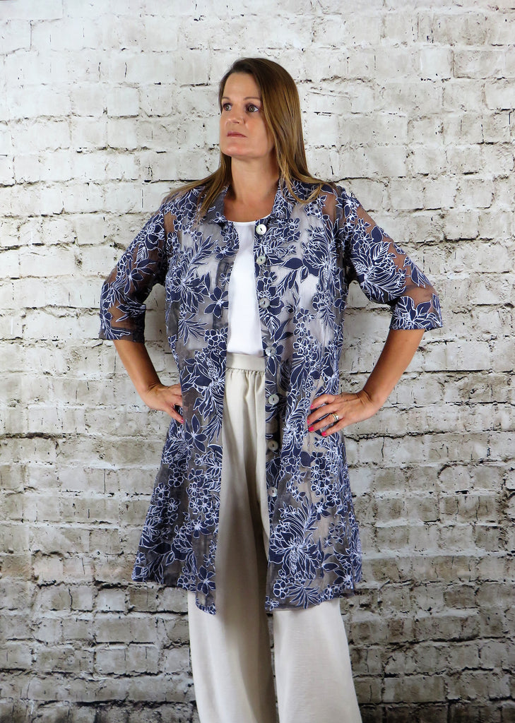 This coat is made from a soft navy organza fabric, with a beautiful all over floral design. Perfect for any spring summer occasion, from a wedding - mother of the bride, mother of the groom and wedding guest to everyday wear. This coat will take you from day to night with effortless style and elegance.