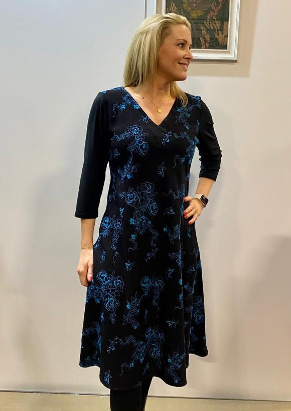 This bias dress is made from a soft black fabric, with a beautiful all over flower design. Perfect for any occasion, or everyday wear. This dress will take you from day to night with effortless style and elegance.