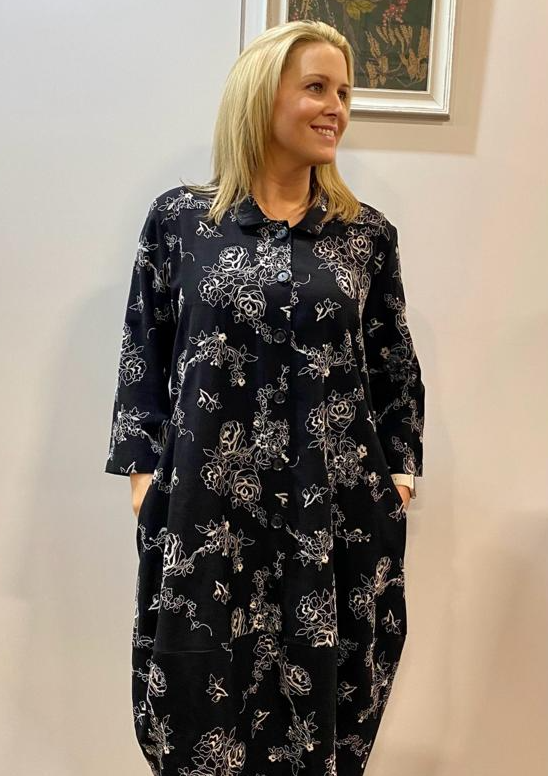 This button front dress is made from a soft black fabric, with a beautiful all over flower design. Perfect for any occasion, or everyday wear. This dress will take you from day to night with effortless style and elegance.