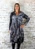 The button twist dress is made from a soft stretch Silver viscose velvet fabric with a twist hem. Perfect for any autumn winter occasion, from a wedding, Mother of the Bride, Mother of the Groom, Wedding Guest to a party or everyday wear. This dress will take you from day to night with effortless style and elegance.