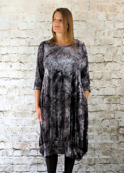 The gathered hem dress is made from a soft stretch Silver viscose velvet fabric. Perfect for any autumn winter occasion, from a wedding, Mother of the Bride, Mother of the Groom, Wedding Guest to a party or everyday wear. This dress will take you from day to night with effortless style and elegance.